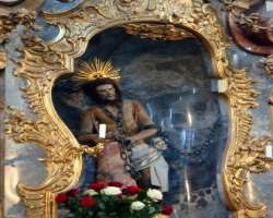 The church is associated with a legend that in 173 The church is associated with a legend that in 1738, there were tears on a dilapidated wooden figure of the Scourged Saviour. When the other people he